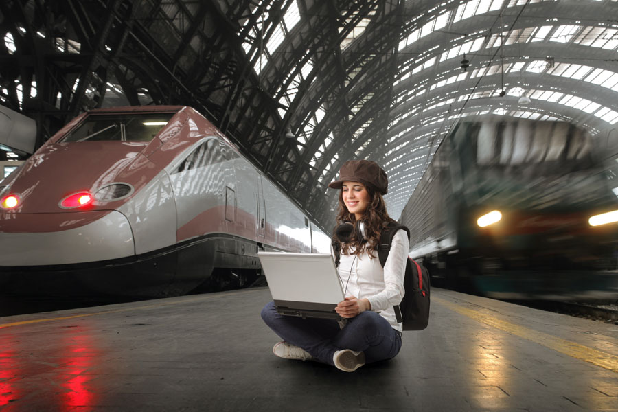 Girl-with-Laptop-Train-Platform